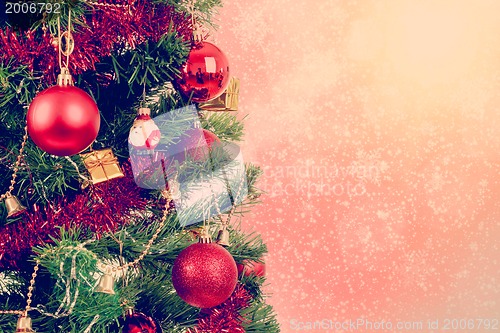 Image of red christmas balls on tree background 