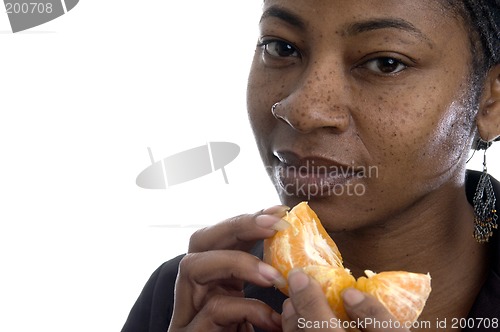 Image of woman with tangerine