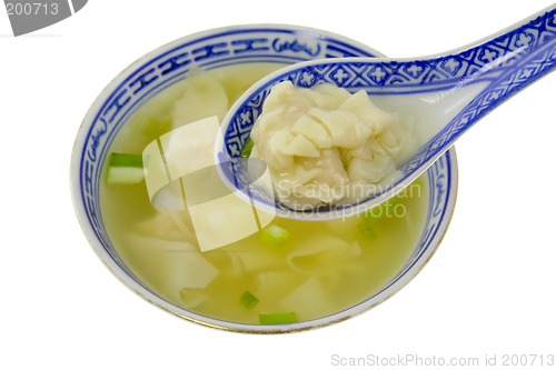 Image of Dumpling soup with spoon

