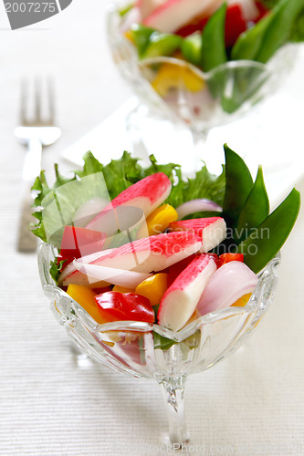 Image of Crab stick with pepper and lettuce salad