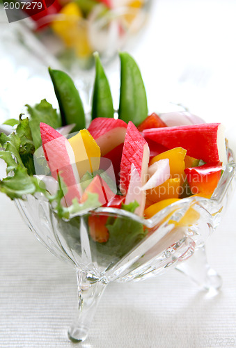 Image of Crab stick with pepper and lettuce salad