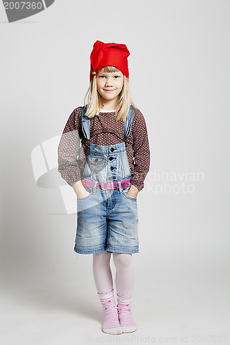 Image of Smiling girl wearing Christmas hat