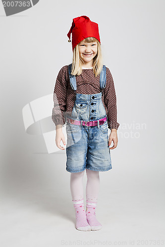 Image of Smiling girl wearing Christmas hat
