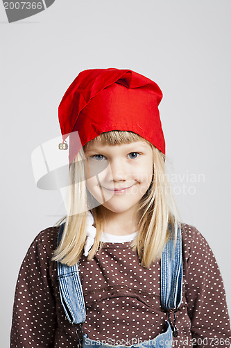 Image of Smiling girl wearing Christmas hat