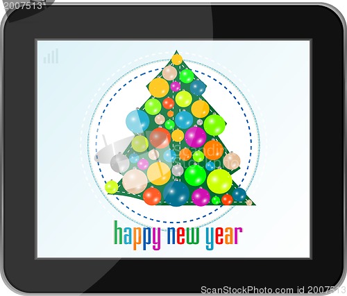 Image of christmas tree with balls on tablet pc