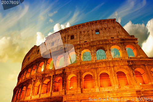 Image of Beautiful dramatic sky over Colosseum in Rome