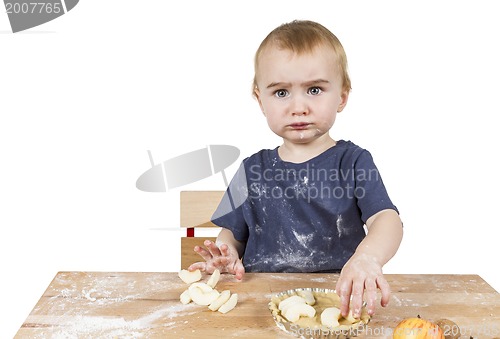 Image of child making cookies