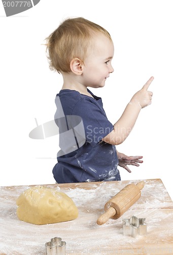 Image of child making cookies