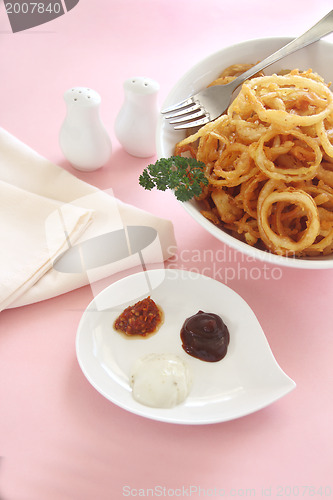 Image of Onion Rings And Condiments