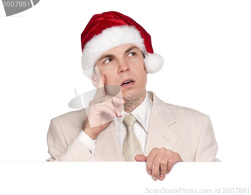 Image of Portrait of man in santa hat