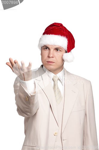 Image of Portrait of man in santa hat