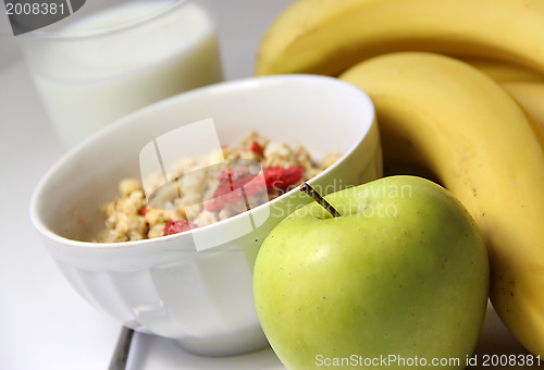 Image of Healthy breakfast: muesli and fruits 