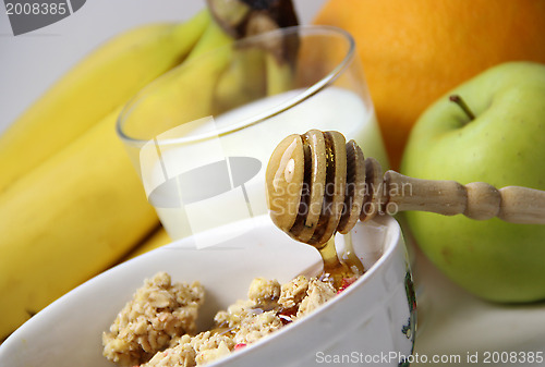 Image of Muesli with honey and fruits