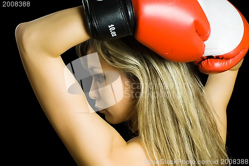 Image of Pretty girl with boxing gloves