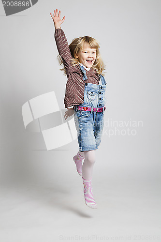Image of Happy young girl jumping