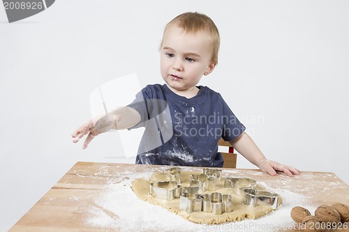 Image of child making cookies