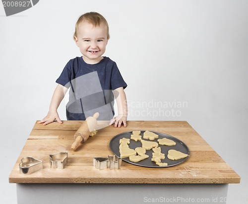 Image of child making cookies