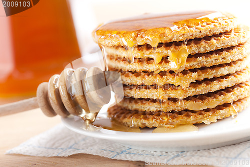 Image of waffle with honey