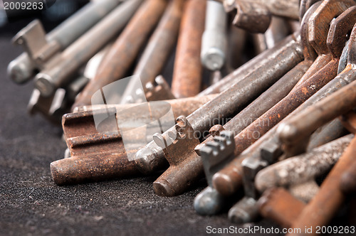 Image of A large group of rusty keys