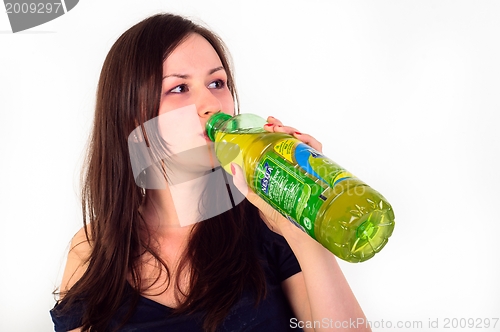 Image of Cheerful young adult with refreshing drink
