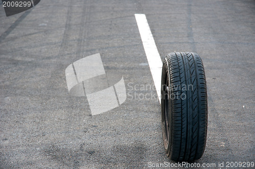Image of Car tire on the road