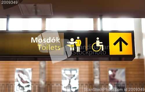 Image of Toilet sign on wall