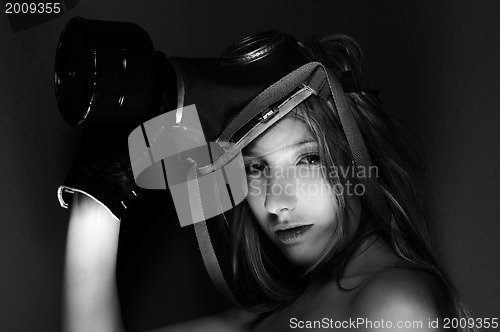 Image of Young woman with a mask closeup