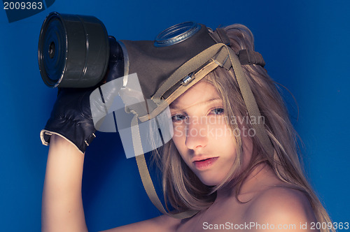 Image of Young woman with a mask closeup