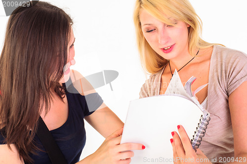 Image of Two beautiful student girls getting ready for school