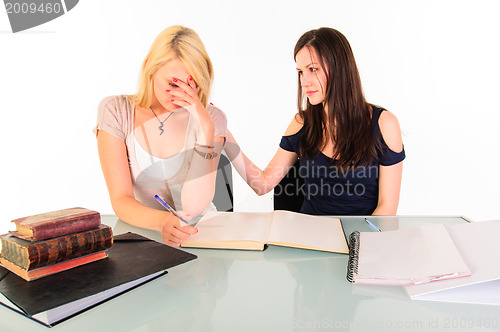Image of Two beautiful student girls getting ready for school