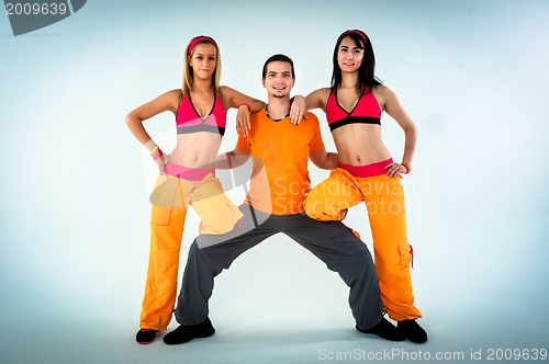 Image of Group of joyful fitness instructors