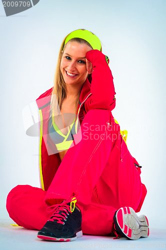 Image of Young woman in sport outfit