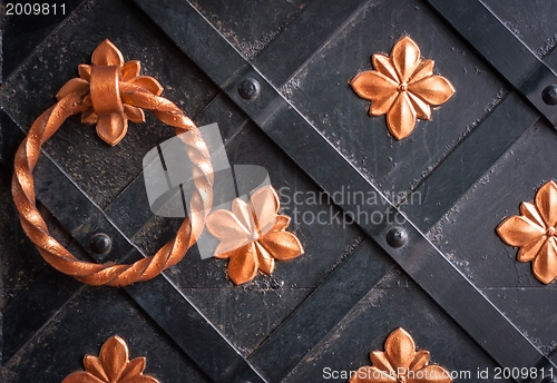 Image of Golden metal lattice on steel background