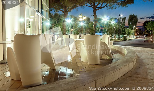 Image of Beautiful outdoor white dining area