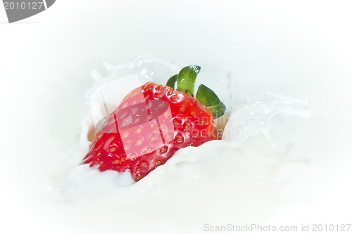 Image of strawberry splashing into milk