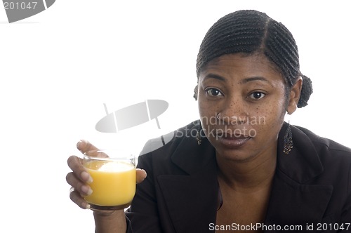 Image of pretty black womanwith orange juice