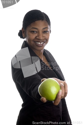 Image of pretty black woman offering apple