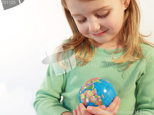 Image of girl holding globe
