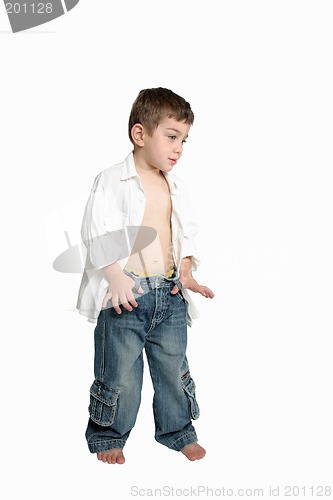 Image of Child with hands in jeans