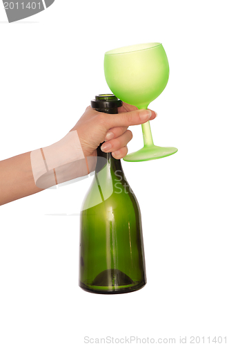 Image of green bottle and wine glass