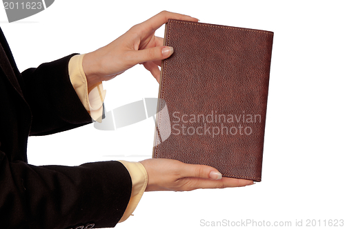 Image of woman holds the business book