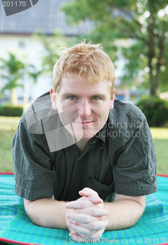 Image of Man relaxing at the park