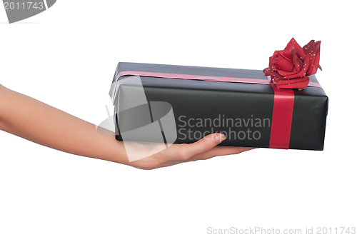 Image of black box with red ribbon as a gift