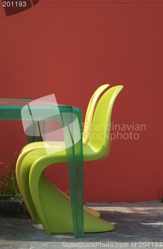 Image of Two plastic chairs