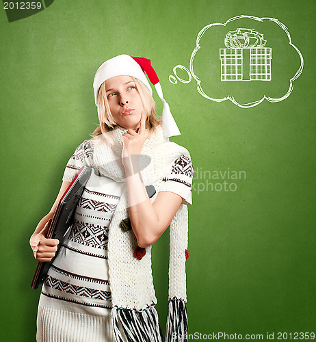 Image of Woman Waiting For Christmas With Laptop