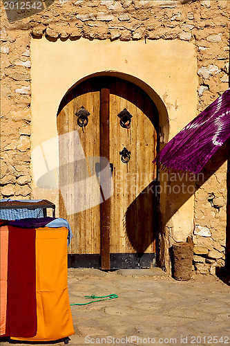 Image of door market and clothes in tamerza 