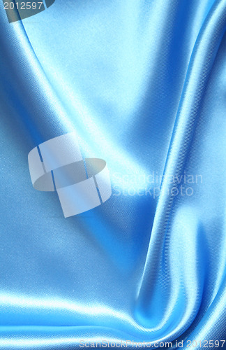 Image of Smooth elegant blue silk as background