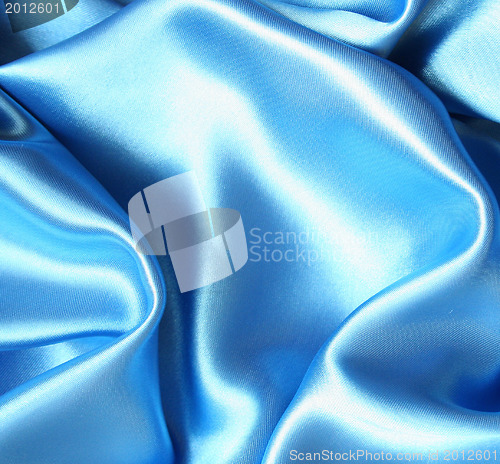 Image of Smooth elegant blue silk as background