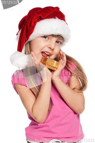 Image of Little girl with gift box