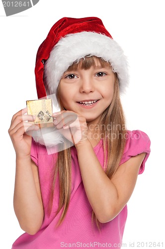 Image of Little girl with gift box